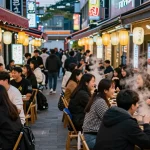 A lively Sangbong-dong 한국관나이트 scene with friends dining outdoors, neon lights, and traditional decor.